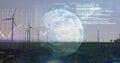 Image of financial data processing over earth and wind turbines Royalty Free Stock Photo