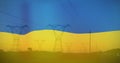 Image of flag of ukraine over field and electricity poles Royalty Free Stock Photo