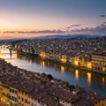 Florence city during golden sunset. Panoramic view to the river Arno, with Ponte Vecchio, Palazzo Vecchio Royalty Free Stock Photo