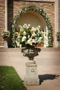 An image of flower with the church doors before a Royalty Free Stock Photo