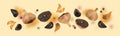 An image of flying black garlic. Black garlic bulbs float in the air on a beige background. Concept of healthy nutrition.