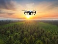 image of flying drone above the farmland field.