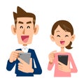 A young couple operating a smartphone with a smile