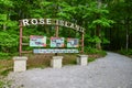 Forest, woodland, trail marker, wooden signs, Rose Island, information stand outside woods, trail