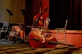 four double basses lie on the stage of the theater during the intermission