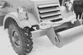 Black and white image of the fragment with the hood of the american M3A1 Scout armored personnel carrier