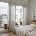 French balcony with wrought iron railings with open shutters and doors with curtain in scandinavian bedroom interior Coffee