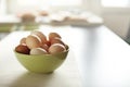 Image of fresh brown chicken eggs in a plate Royalty Free Stock Photo
