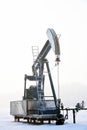 Frost Covered Oil Field Pump Jack Royalty Free Stock Photo