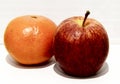 Fruits: tangerines and aplles on a Light background