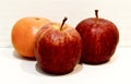 Fruits: tangerines and aplles on a Light background