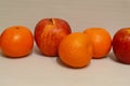 Fruits: tangerines and aplles on a Light background