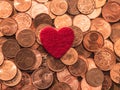 Image full of Euro cents and red heart, copper coin, one and two cents coin will be dismissed by ECB Royalty Free Stock Photo