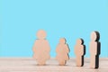 The image of a full family. Wooden figures Royalty Free Stock Photo