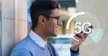 Image of 5G text written in circle on scope scanning, man talking on smartphone Royalty Free Stock Photo