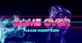 Image of game over text banner over blue light digital waves against purple background Royalty Free Stock Photo