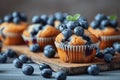 Close-Up of Delicious Blueberry Muffins on Minimalist Table