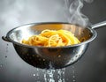 Pasta strainer with spaghetti Royalty Free Stock Photo