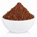 Cocoa powder in bowl on a white background Royalty Free Stock Photo