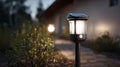 Small Solar Powered LED Light with Motion Sensor for Outdoor Security Lighting Royalty Free Stock Photo
