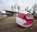 Huge Christmas ornaments sit in the park outside of World of Coca Cola in Atlanta, Georgia Royalty Free Stock Photo