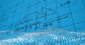 Image of glitter, math formulas and numbers on blue background