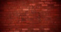 Image of glowing neon thumb up icon on brick wall