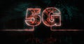 Image of glowing orange 5g text over blue processor socket Royalty Free Stock Photo