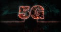 Image of glowing orange 5g text over blue processor socket Royalty Free Stock Photo