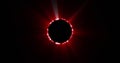Image of glowing red circle eclipse over black background Royalty Free Stock Photo