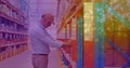 Image of glowing spots of light over caucasian man carrying box working in warehouse, Royalty Free Stock Photo