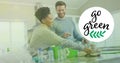 Image of go green text and light spots over diverse couple sorting plastic bottles