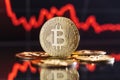 Image of golden bitcoin isolated on digital chart with red line representing global recession Royalty Free Stock Photo