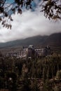 Image of a grand castle situated on a rocky mountain peak in the Rocky Mountains Royalty Free Stock Photo