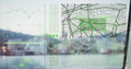 Image of graph, loading circles, navigation pattern over modern cityscape against sky
