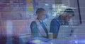 Image of graphs, binary codes, lens flare, programming language, diverse coworkers using laptop Royalty Free Stock Photo