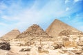 Image of great pyramid of Giza. Cairo, Egypt. In the foreground is a and small pyramids of priests Royalty Free Stock Photo