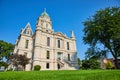 Green lawn and blue sky day with front view of Whitley County Courthouse entrance Royalty Free Stock Photo
