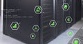 Image of green technology icons and coding over data server room Royalty Free Stock Photo
