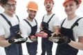 Image of a group of builders with gas keys