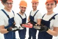 Image of a group of builders with gas keys