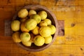 Image of group of fresh lemons over old vintage wooden table Royalty Free Stock Photo