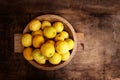 Image of group of fresh lemons over old vintage wooden table Royalty Free Stock Photo