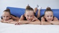 Image of a group of little girls in the gym after a workout. Gymnastics concept