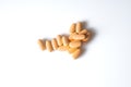 Image of orange pills isolated with shadows