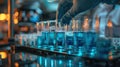 Scientific Researchers Conducting Analysis with Blue Liquid in Laboratory for Medical and Technological Development - Copy Space A Royalty Free Stock Photo