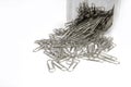 Image of the group steel paperclips on white background Royalty Free Stock Photo