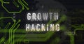 Image of growth hacking text over motherboard and processing data on black