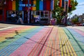 Gyro Xpress store front with main view of rainbow crosswalk on bright sunny day