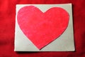 HANDMADE VALENTINE CARD DISPLAYING A RED HEART IN RED CRAYON Royalty Free Stock Photo